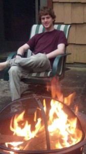 The last picture of Andrew at home, sitting by his new fire pit.